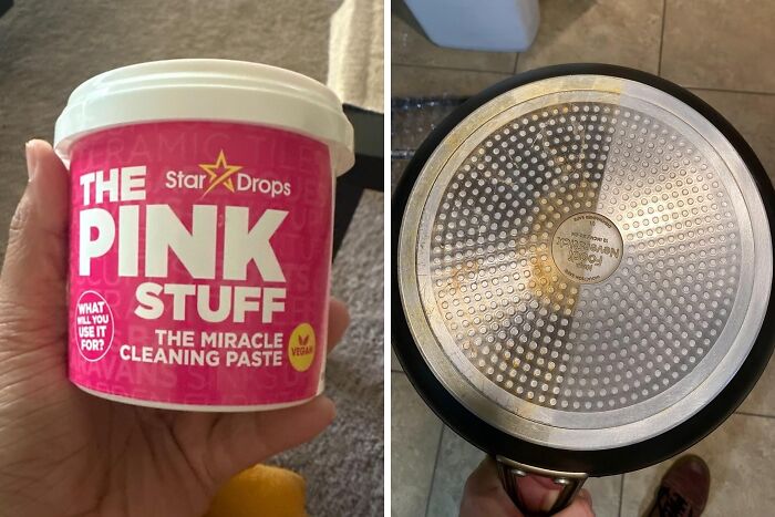 Hand holding The Pink Stuff cleaning paste and bottom of a clean metal pan, popular most-wished-for Amazon find.