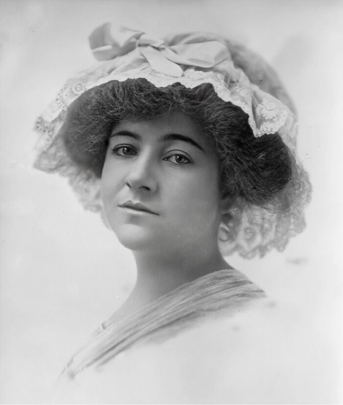Black and white portrait of a woman wearing a lace bonnet, one of the famous people mysteriously disappeared and never found.