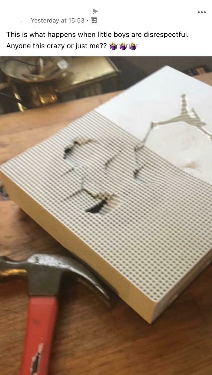 Hammer and damaged book on a table, depicting a moment of toxic mother behavior.
