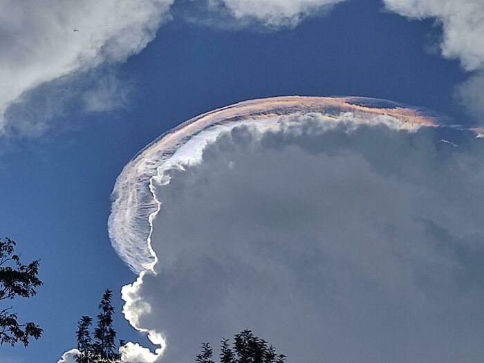 Colorful cloud formation against a blue sky, showcasing fascinating cloud shapes and natural beauty.