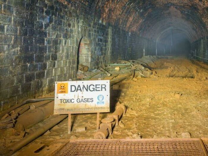 Seen Halfway Into An Abandoned Rail Tunnel