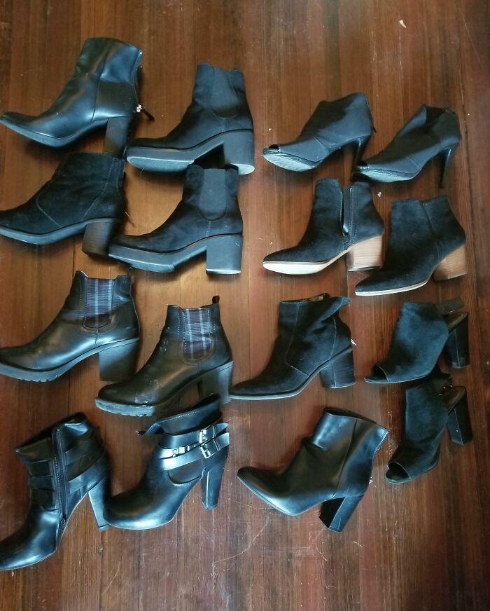 Collection of black high-heeled ankle boots arranged on wooden floor, related to infuriating relationships.