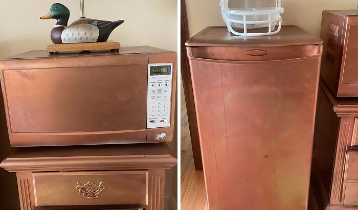 Home improvement fails: Bronze-colored microwave and fridge with decorative items on top in a modern kitchen setting.