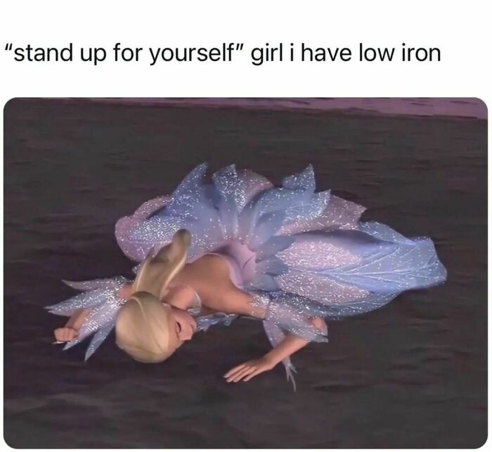 Relatable meme showing a cartoon girl lying down tired, humorously captioned about low iron and standing up.