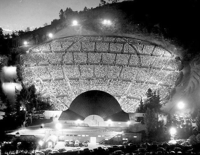 Aerial view of a packed amphitheater at night, offering a new perspective on a famous venue.