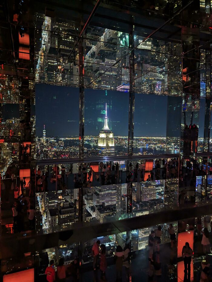 Mirrored room views make the Empire State Building appear surreal and interesting, reflecting a not photoshopped illusion.