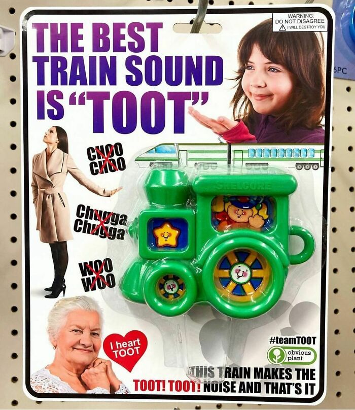 Green toy train labeled fake product with humorous packaging showing a girl and an elderly woman promoting train sound "Toot"