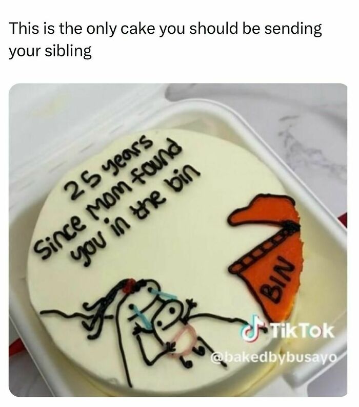 Humorous cake with text about siblings barely holding it together, featuring a crying cartoon character and trash bin illustration.