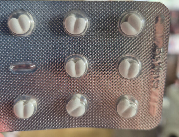 Heart-shaped pills in a blister pack, showcasing exceptional design creativity and precision.