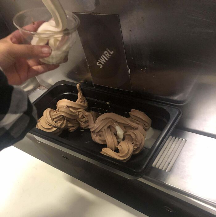 Soft serve ice cream left in a tray instead of a cone, demonstrating inconsiderate behavior.