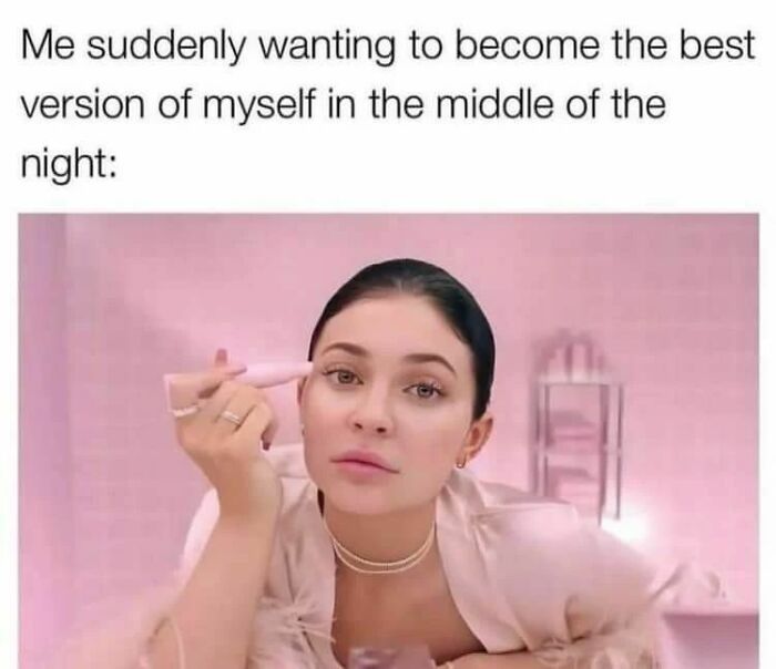 Woman applying makeup with intense focus, relatable meme about self-improvement and motivation late at night.