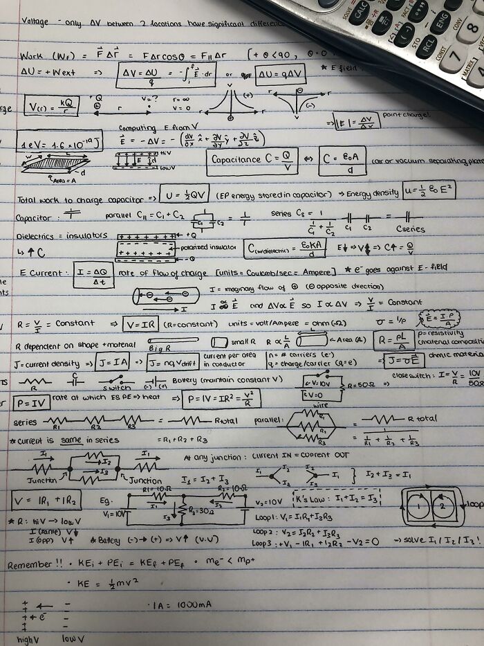 Neatly handwritten physics notes with complex equations, showcasing exceptional handwriting skills beside a calculator.