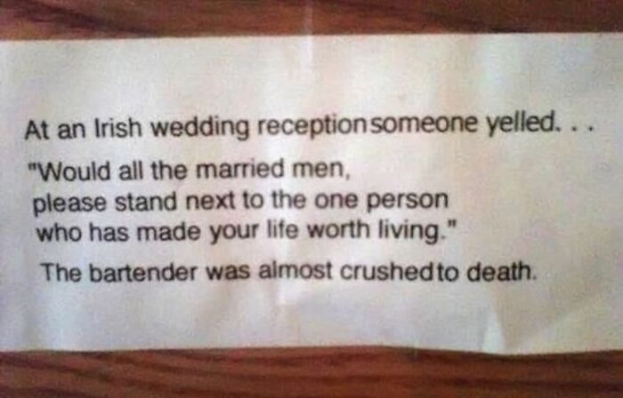 Funny Irish wedding joke sign about married men gathering around a bartender.