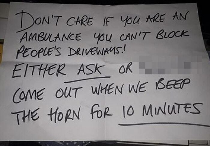 Handwritten note expressing an upset message about an ambulance blocking a driveway, illustrating extreme entitled-people-requests.