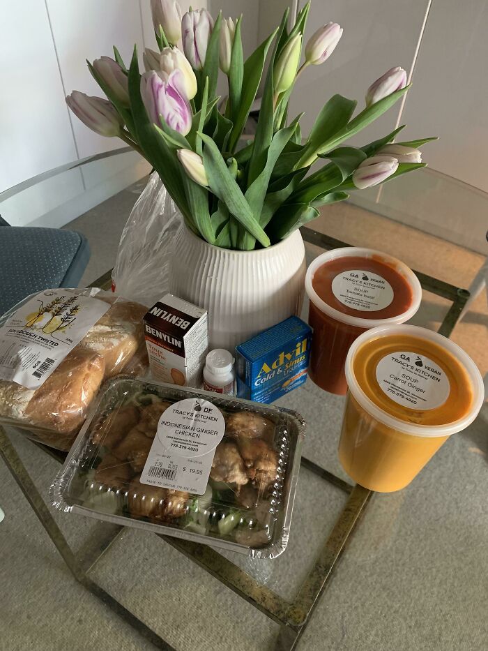 Tulips and groceries on a table, a thoughtful gesture from an amazing mother-in-law.