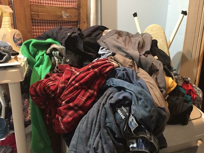 Pile of clothes creating chaos, evoking thoughts of infuriating family members.
