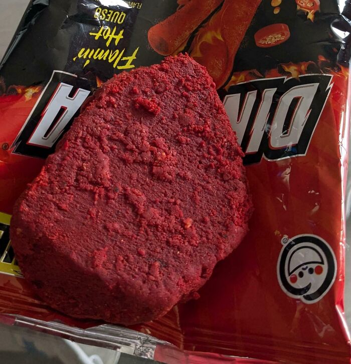 Bought A Bag Of Flaming Hot Snacks And Found This Monster Inside Of The Bag Instead