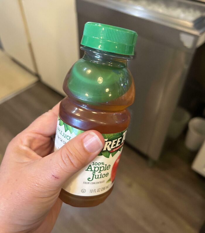 This (Unopened) Bottle Of Apple Juice Came With An Extra Cap