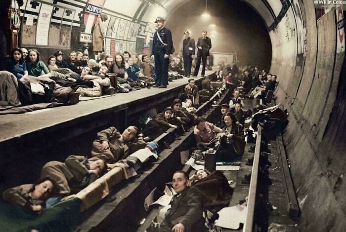 People sheltering in a London Underground station during WWII, an historical scene not commonly seen in textbooks.