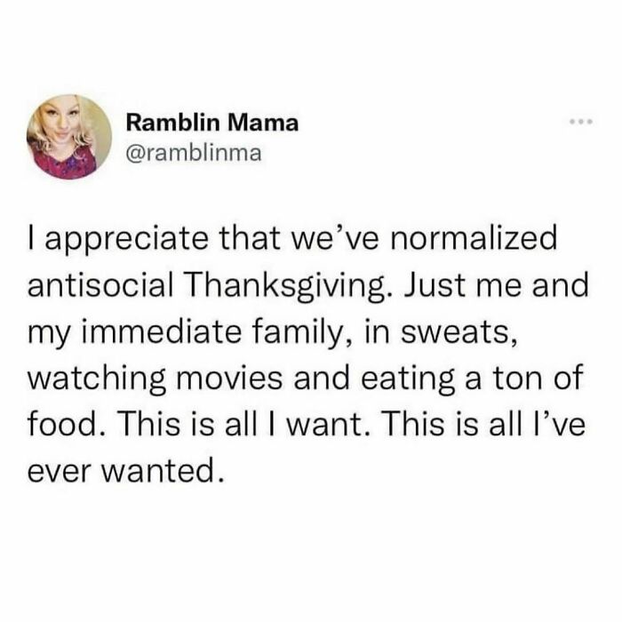 Tweet about enjoying an antisocial Thanksgiving with family in comfort, watching movies, and eating food.