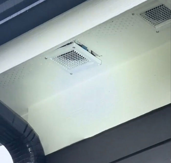 Inspection reveals issues in a $1,600,000 home, built 2 years ago, showing a damaged vent on the ceiling.