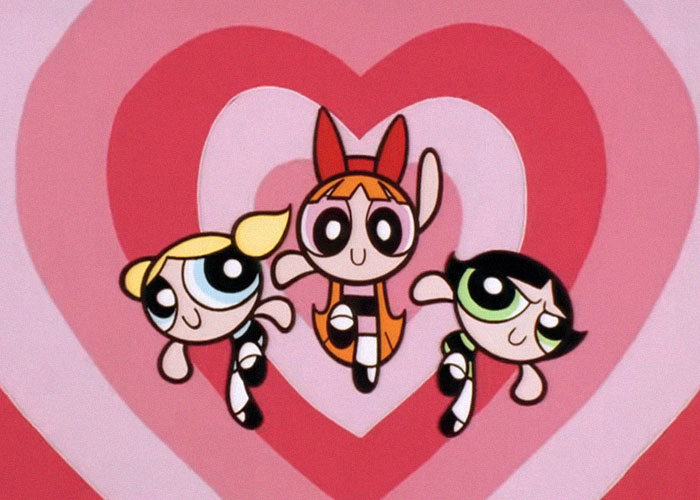 Animated 90s trend characters in heart-themed background, showcasing nostalgia.