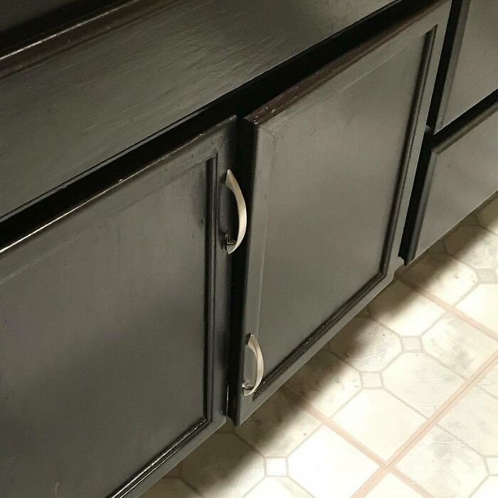 Misaligned cabinet handles show a funny home improvement fail.