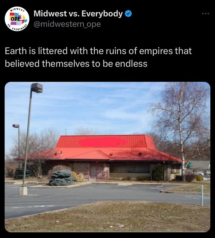Abandoned Midwest restaurant with a red roof and overgrown landscaping, highlighting unique Midwest charm.