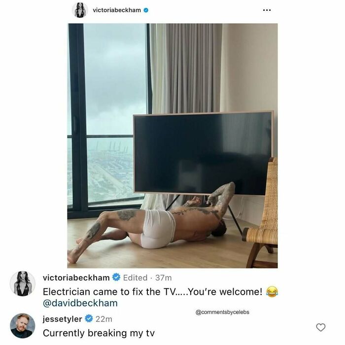 Celebrity lying under a TV, with funny comments joking about TV repair.