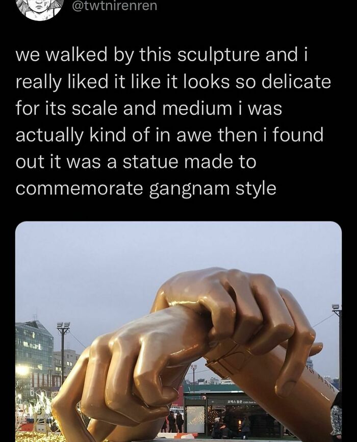 Sculpture of large bronze hands from a funny meme about Gangnam Style monument, creating an unbruhthered vibe.