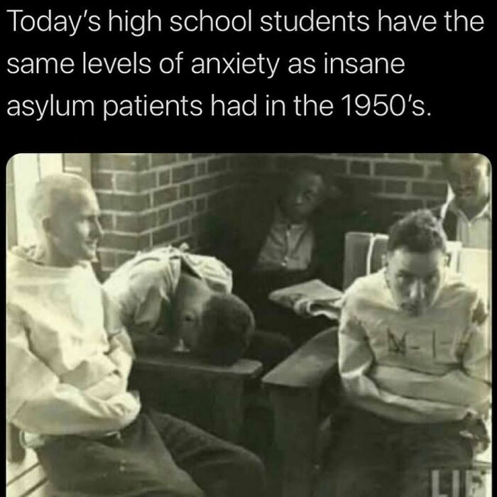 Vintage photo of asylum patients, illustrating weird facts about anxiety levels.