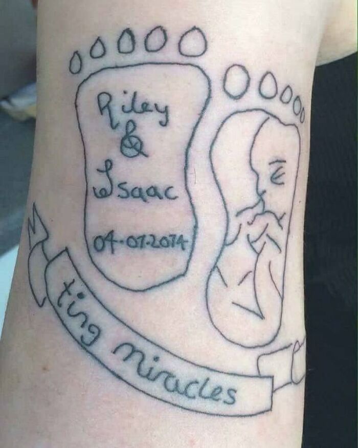 Tattoo of baby footprints with names Riley & Isaac, featuring an awkward design and text error, highlighting a permanent mistake.