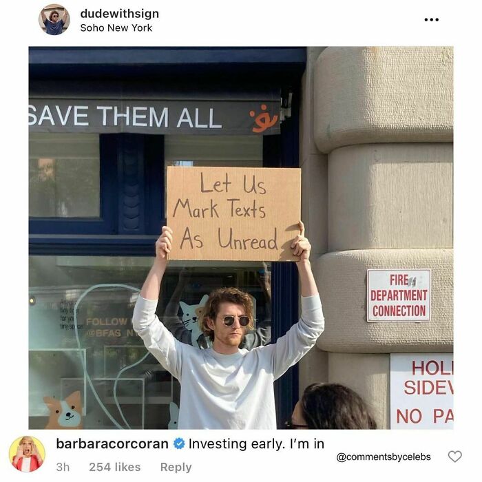 Person holding a sign saying "Let Us Mark Texts As Unread" with a funny comment below from a celeb on social media.