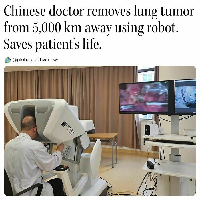 Doctor using a robot for remote surgery on a patient from 5,000 km away, showcasing uplifting medical innovation.