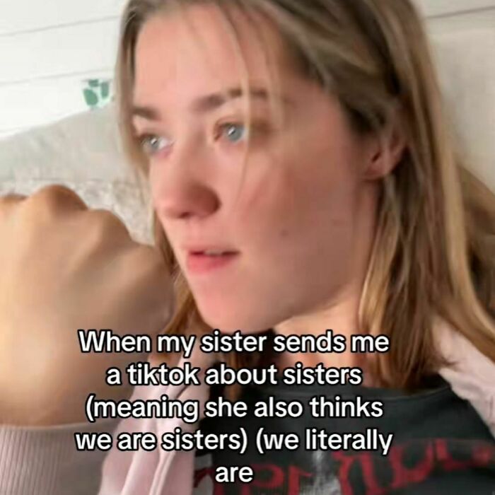 Woman making a funny expression, illustrating a humorous meme about sisters.