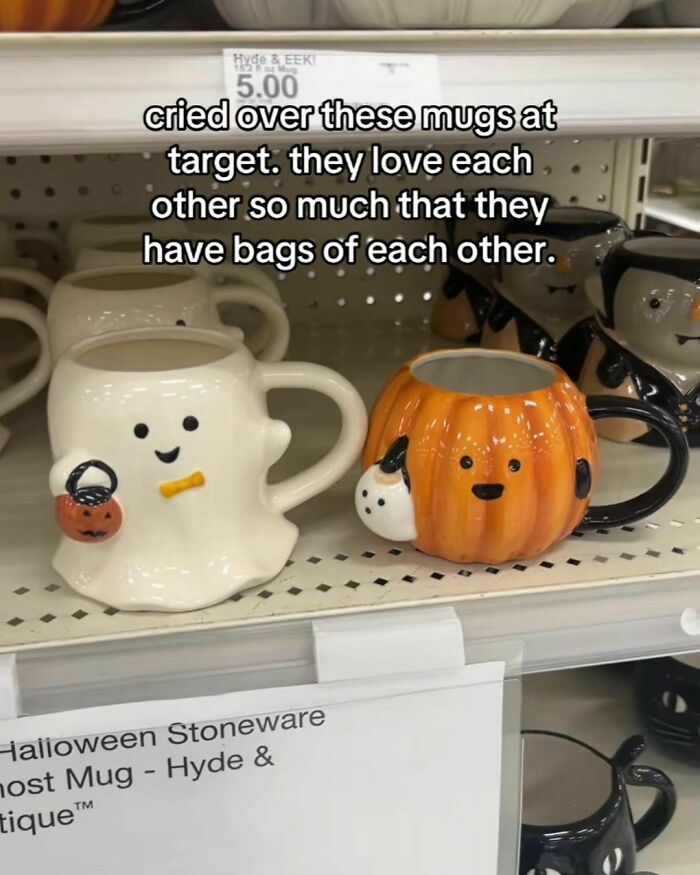 Funny Halloween mugs on display at Target, featuring a ghost and pumpkin theme, each holding a themed bag.