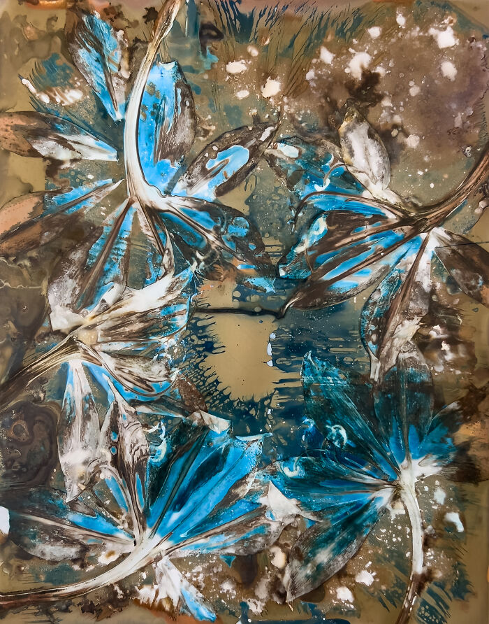 Abstract artwork by Carolyn Moore featuring blue and brown tones with dynamic brush strokes and splatter effects.