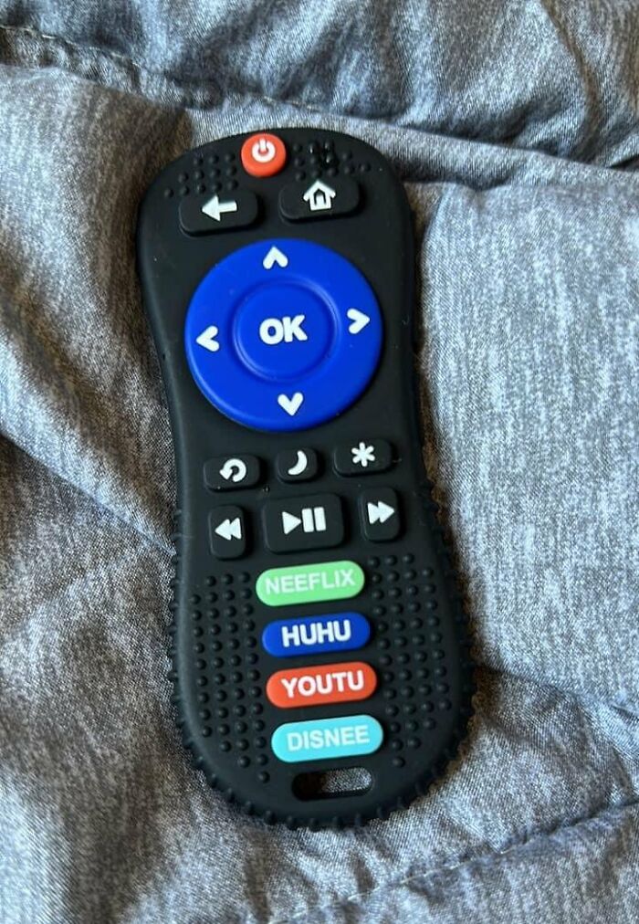 Remote control with misspelled buttons mimicking popular streaming apps, illustrating online shopping fails.