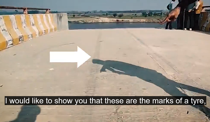 Unfinished bridge with car tire marks, sparking concerns after alleged Google Maps error. Unfinished bridge with car tire marks, sparking concerns after alleged Google Maps error.