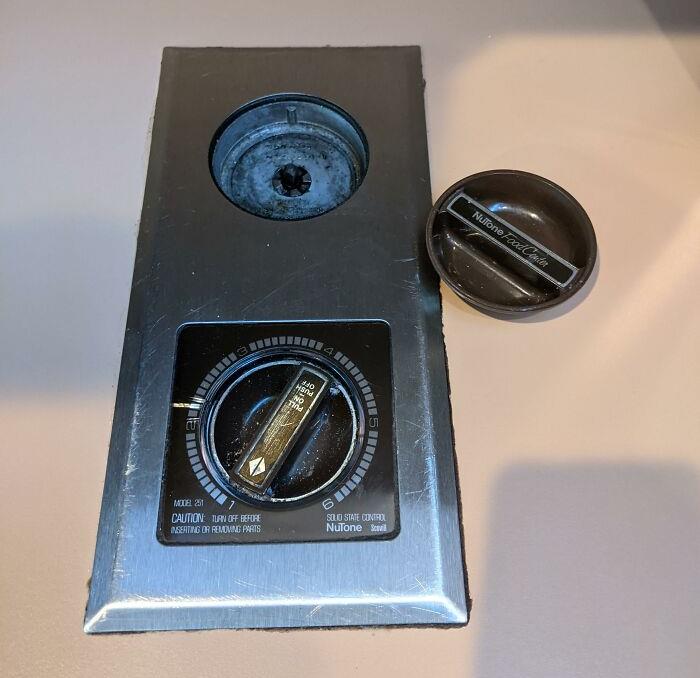 Obsolete luxury home feature: Vintage built-in countertop appliance control panel.