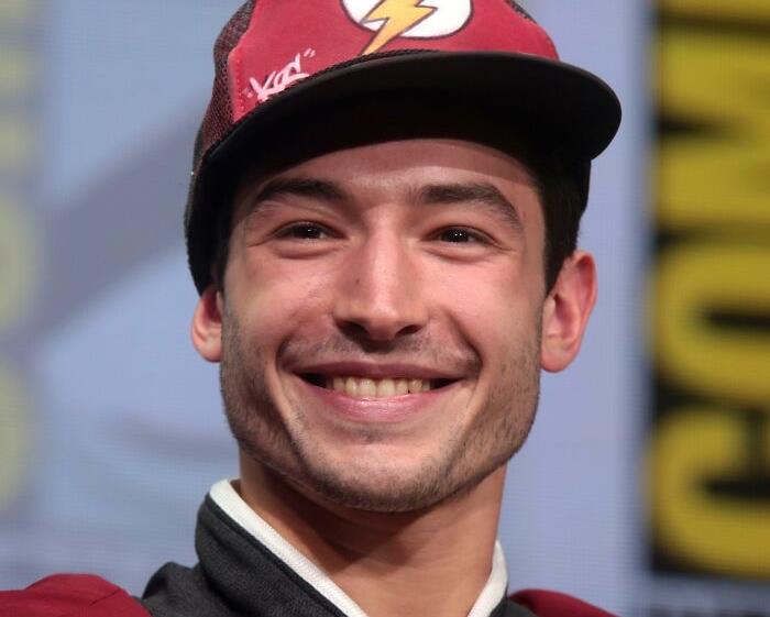 A smiling person wearing a hat at a public event, related to celebrities people lost respect for.