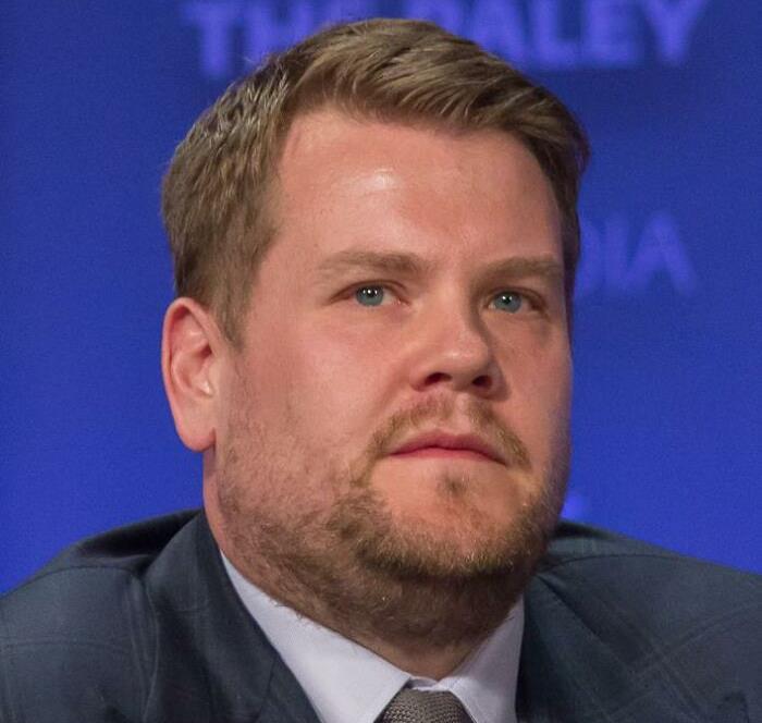 A person in a blue suit with a contemplative expression, related to celebrities losing respect.