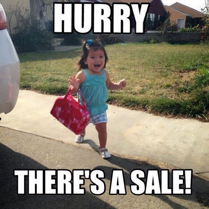Toddler running excitedly with a pink bag, capturing the essence of funny Black Friday memes.