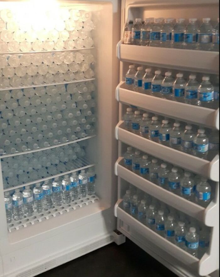 Fridge packed with bottled water from the Instagram account ‘Dude Fridges’.