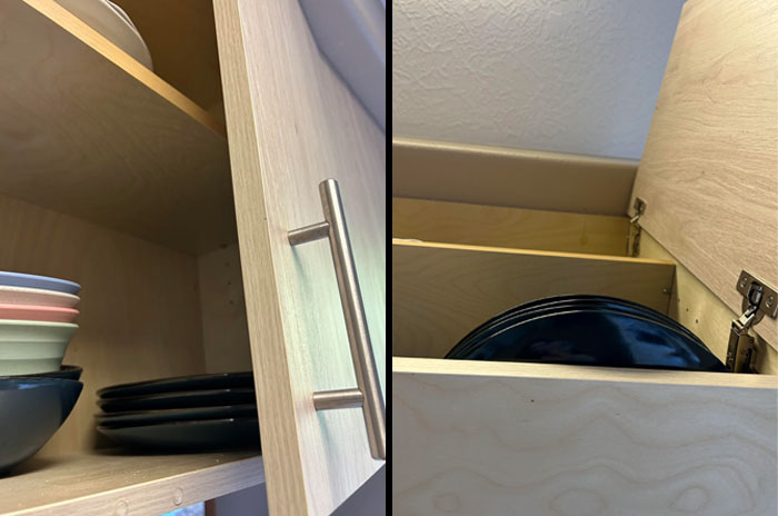 Home improvement fail: misaligned kitchen cabinet shelves with mismatched black plates inside.