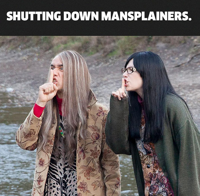 Two people in a mansplaining meme gesture silence with fingers to lips, captioned "SHUTTING DOWN MANSPLAINERS."