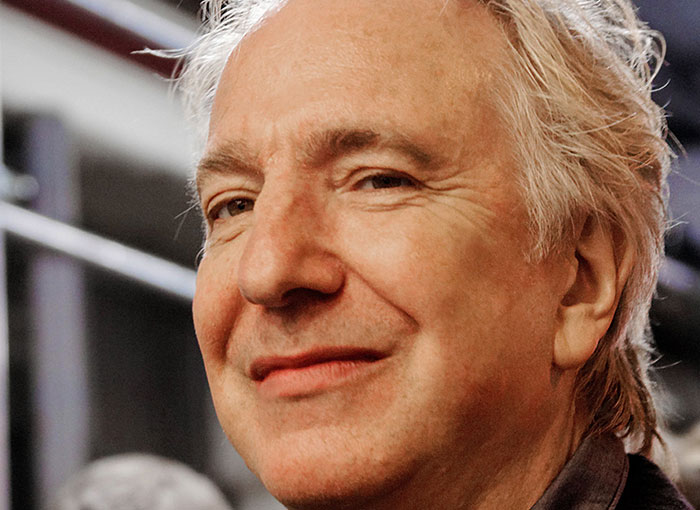 Smiling person from Hollywood at an event, showcasing insider aspects of the entertainment industry.