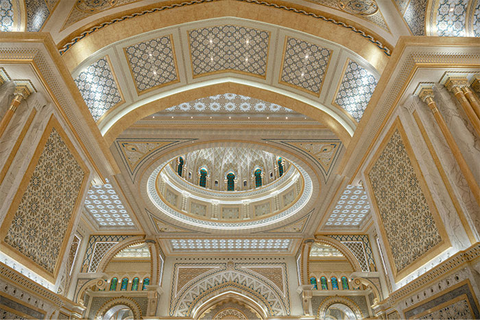 Ornate architectural ceiling with intricate patterns in a hyped travel destination.