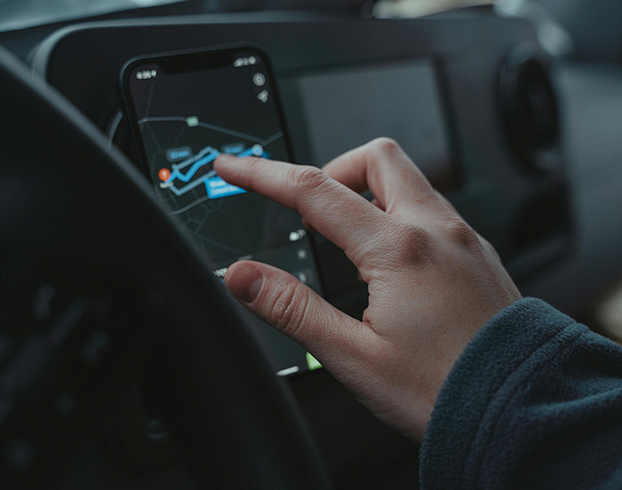 Person navigating with phone GPS. Person navigating with phone GPS.