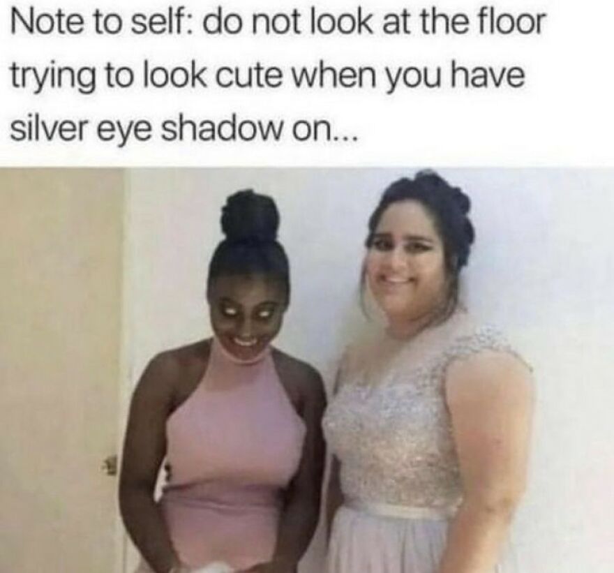 Two women posing humorously, one with silver eyeshadow looking down. Funny meme for laughter seekers.